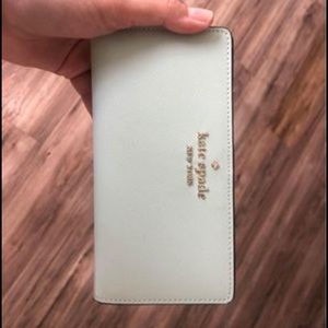 Kate spade staci large slim bifold wallet. Crystal blue (light mint)